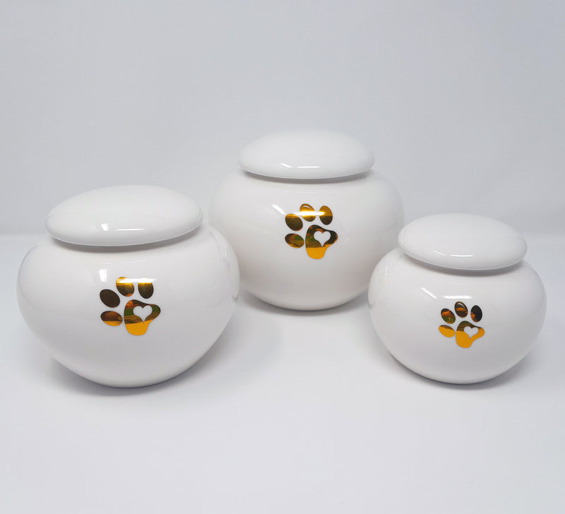 Tierurne in moderner Vasenform mit goldener Pfote