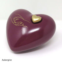 Hundeurne in Herzform mit Pfote in Hand Zeichnung Aubergine