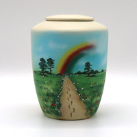 Humanurne mit Teelichteinsatz mit einer Regenbogenlandschaft